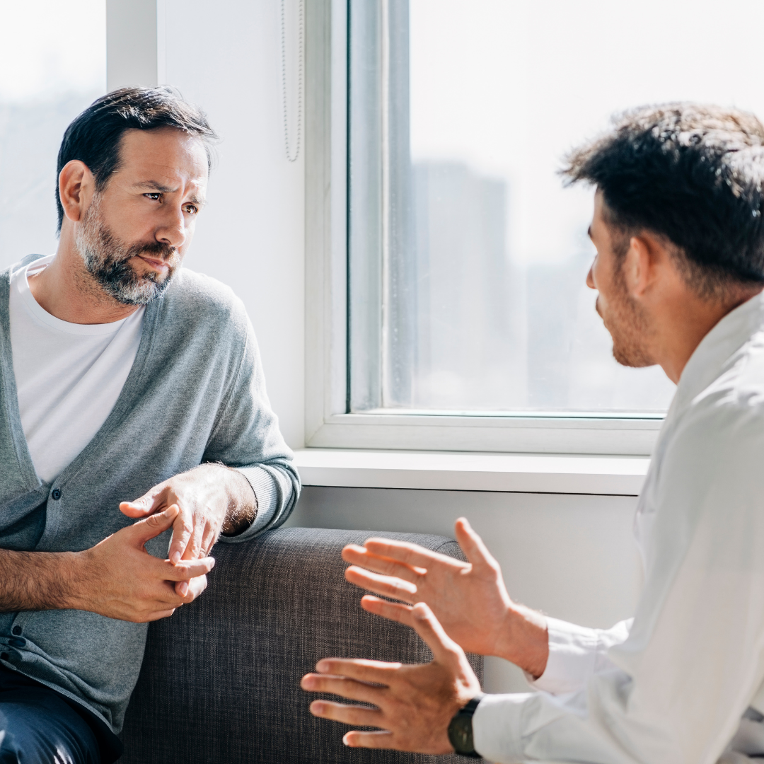 men talking together at counseling